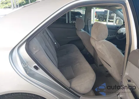 2003 Toyota Camry Le from USA, damaged, VIN 4T1BE32K23U134687